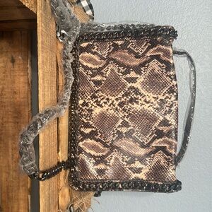 Aldo cross body purse. Never been used. Metal link strap.